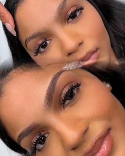 Healed ombré brows on a client, shaped with a spoolie brush.